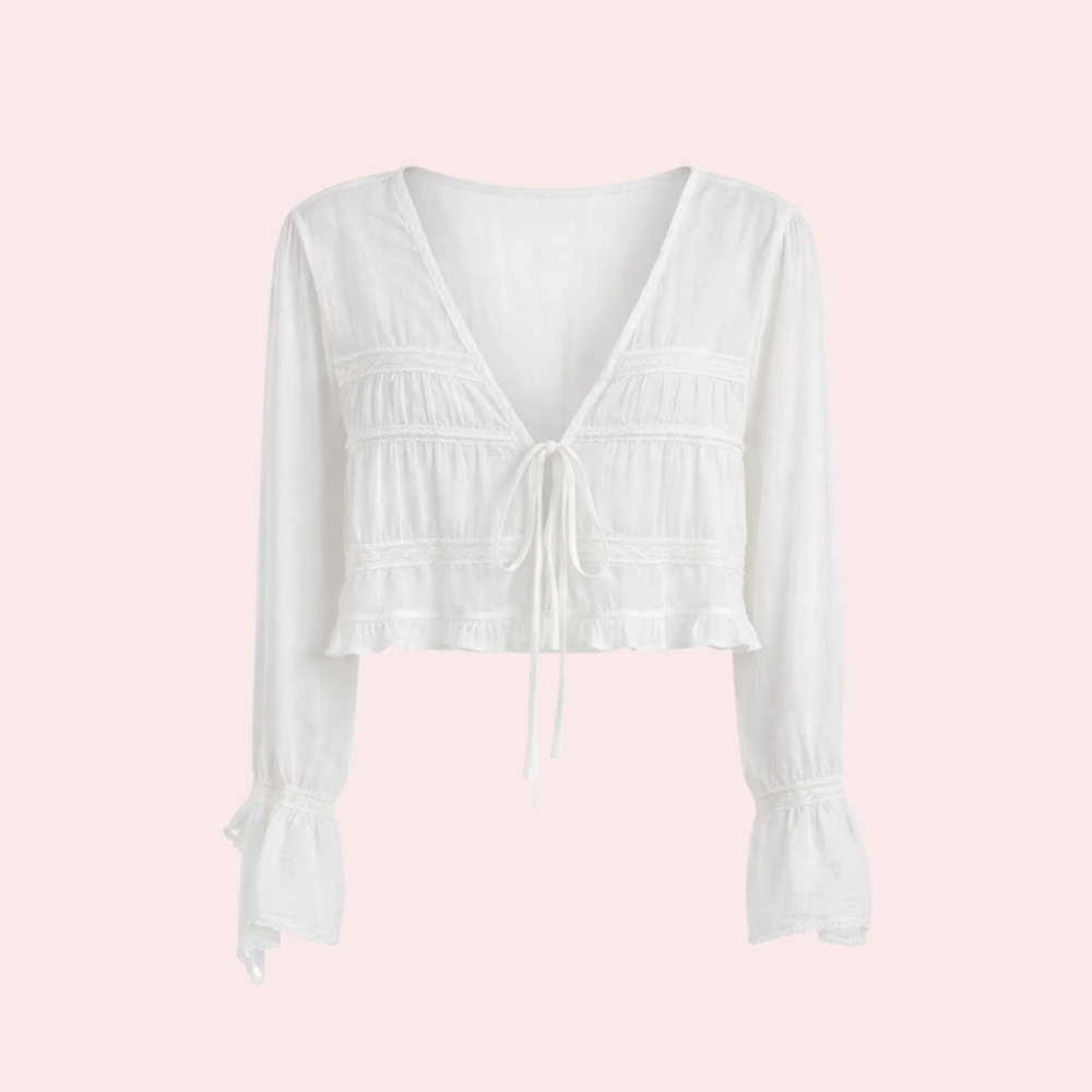 Blusa de manga larga con lazo